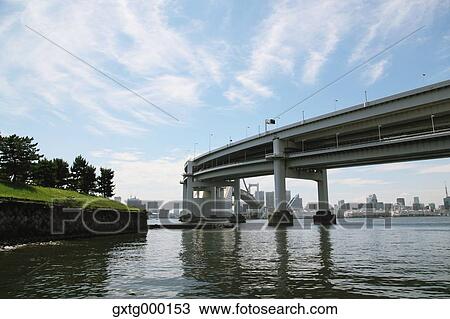 Stock Image - "View of Rainbow Bridge, Tokyo, Japan". Fotosearch