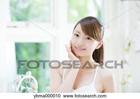 Stock Image - Attractive young girl portrait. Fotosearch