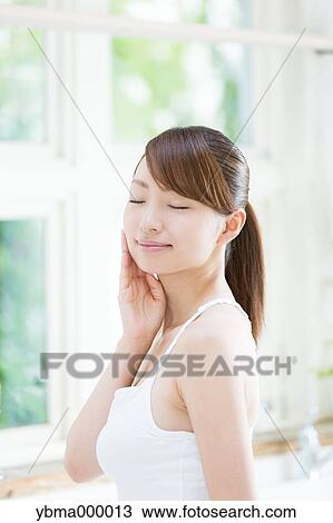 Stock Image - Attractive young girl portrait. Fotosearch