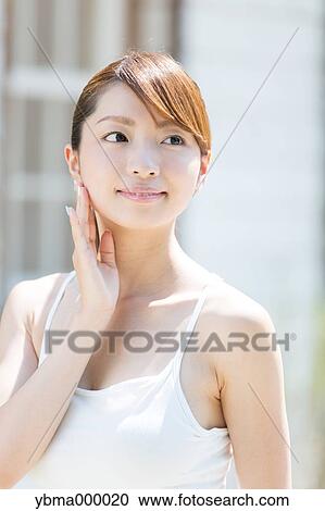 Stock Image - Attractive young girl portrait. Fotosearch