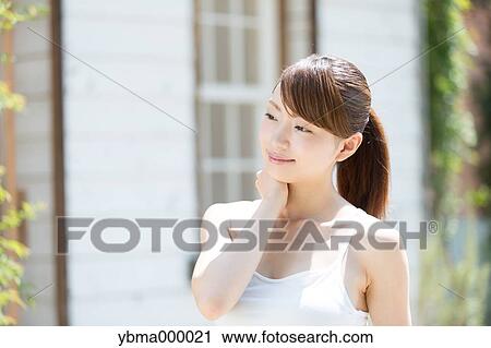 Attractive young girl portrait View Large Photo Image Stock Image - Attractive young girl portrait. Fotosearch