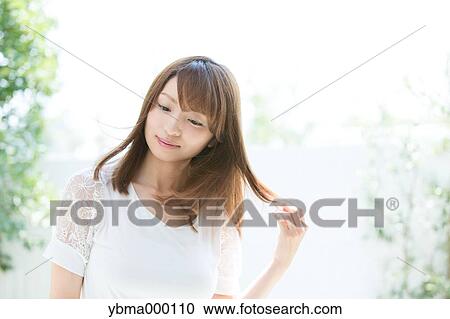 Attractive young girl portrait View Large Photo Image Stock Image - Attractive young girl portrait. Fotosearch