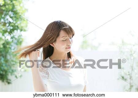 Stock Image - Attractive young girl portrait. Fotosearch