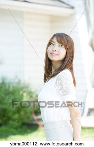 Attractive young girl portrait View Large Photo Image Stock Image - Attractive young girl portrait. Fotosearch