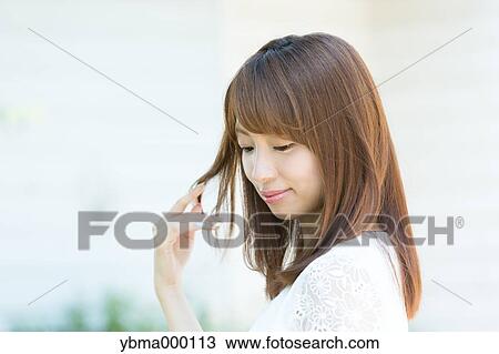 Attractive young girl portrait View Large Photo Image Stock Image - Attractive young girl portrait. Fotosearch