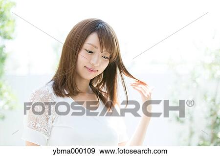 Stock Photo - Attractive young girl portrait. Fotosearch