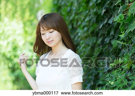 Attractive young girl portrait View Large Photo Image Stock Photo - Attractive young girl portrait. Fotosearch