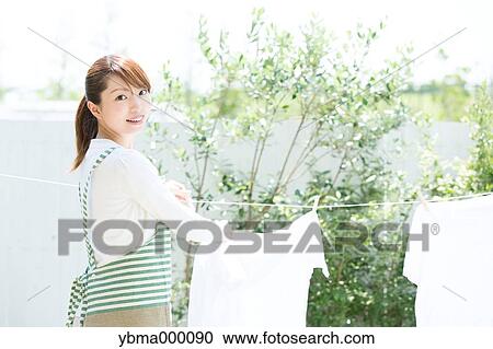 Attractive young housewife View Large Photo Image Stock Image - Attractive young housewife. Fotosearch