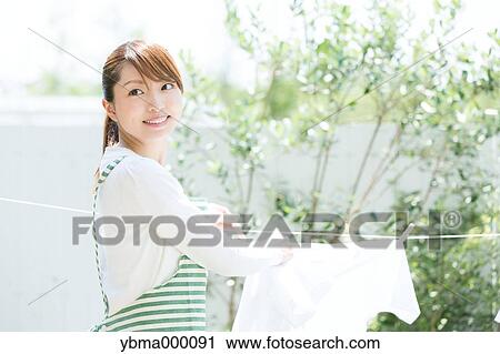 Attractive young housewife View Large Photo Image Stock Image - Attractive young housewife. Fotosearch
