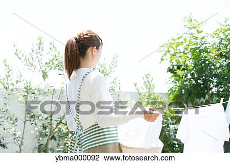 Attractive young housewife View Large Photo Image Stock Image - Attractive young housewife. Fotosearch