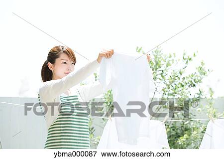 Attractive young housewife View Large Photo Image Stock Photo - Attractive young housewife. Fotosearch