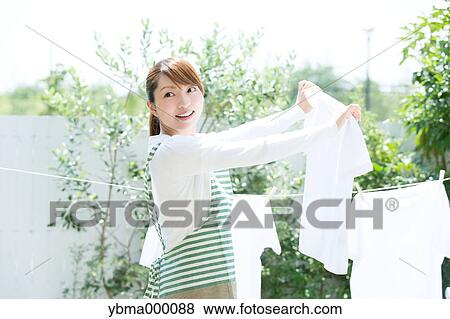 Attractive young housewife View Large Photo Image Stock Photo - Attractive young housewife. Fotosearch