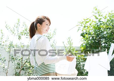Attractive young housewife View Large Photo Image Stock Photography - Attractive young housewife. Fotosearch