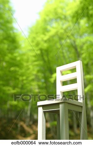 Chair in nature View Large Photo Image Picture - Chair in nature. Fotosearch