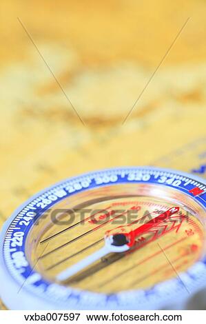 Map and compass View Large Photo Image Stock Photo - Map and compass. Fotosearch