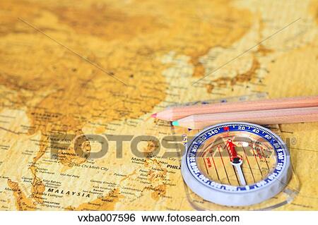 Stock Photograph - Map and compass. Fotosearch