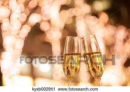 Stock Image - Toasting with champagne. Fotosearch