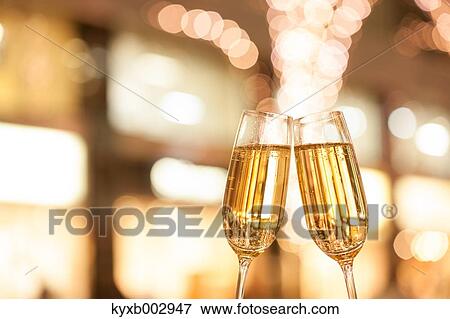Toasting with champagne View Large Photo Image Stock Photo - Toasting with champagne. Fotosearch