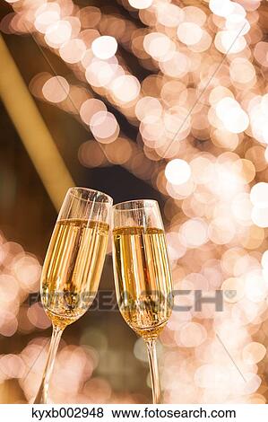Toasting with champagne View Large Photo Image Stock Photo - Toasting with champagne. Fotosearch