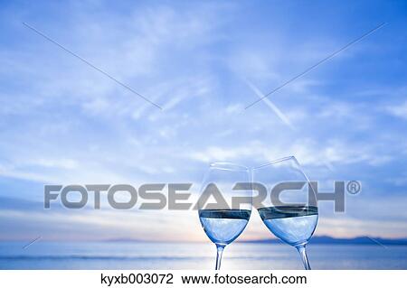 Stock Image - Toasting with wine. Fotosearch