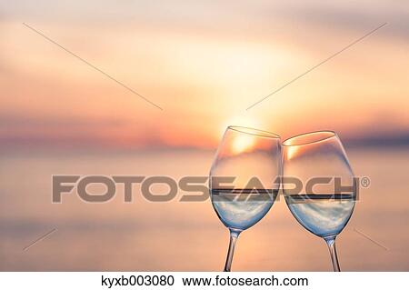 Stock Image - Toasting with wine. Fotosearch