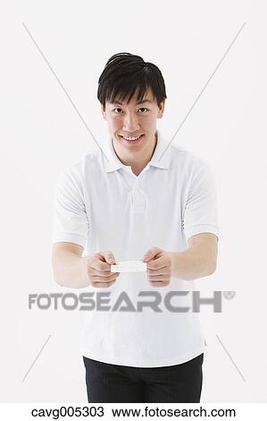 Businessman giving business card View Large Photo Image Stock Image - Businessman giving business card. Fotosearch
