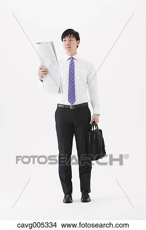 Picture - Businessman with newspaper. Fotosearch