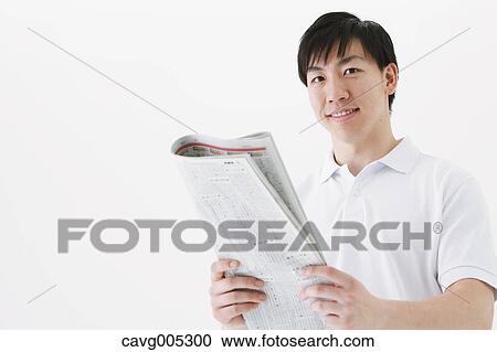 Businessman with newspaper View Large Photo Image Stock Image - Businessman with newspaper. Fotosearch
