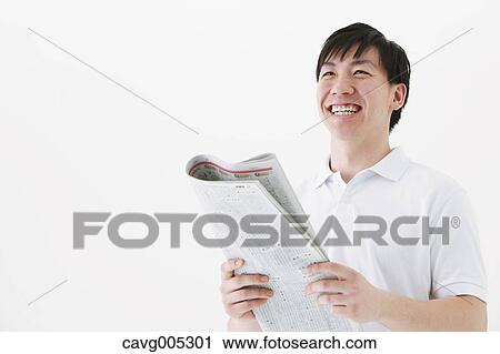 Businessman with newspaper View Large Photo Image Stock Image - Businessman with newspaper. Fotosearch