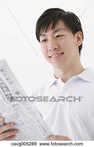 Stock Photo - Businessman with newspaper. Fotosearch