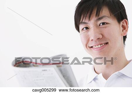 Businessman with newspaper View Large Photo Image Stock Photo - Businessman with newspaper. Fotosearch