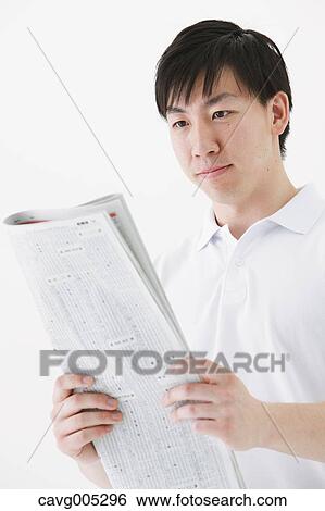 Businessman with newspaper View Large Photo Image Stock Photograph - Businessman with newspaper. Fotosearch