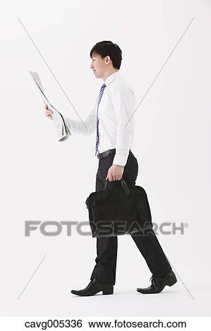 Stock Photograph - Businessman with newspaper. Fotosearch