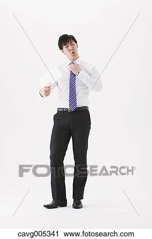Businessman with paper fan View Large Photo Image Stock Image - Businessman with paper fan. Fotosearch