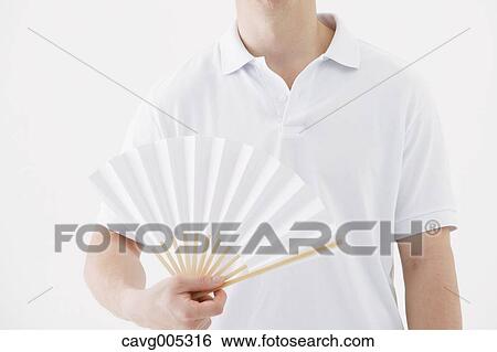 Stock Photograph - Businessman with paper fan. Fotosearch