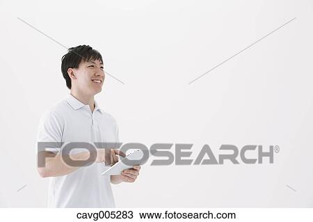 Businessman with tablet View Large Photo Image Stock Image - Businessman with tablet. Fotosearch
