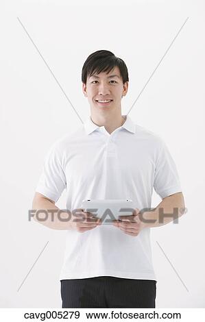Stock Photo - Businessman with tablet. Fotosearch
