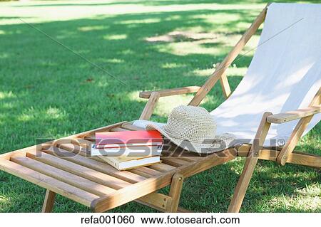 Deck chair in a city park View Large Photo Image Stock Image - Deck chair in a city park. Fotosearch