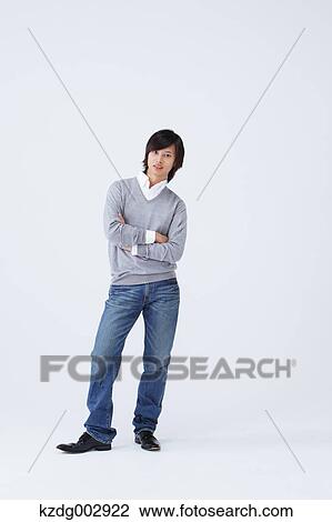 Full body view of young man wearing jeans View Large Photo Image Stock Image - Full body view of young man wearing jeans. Fotosearch