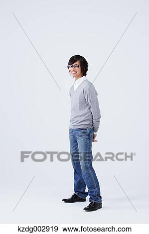 Full body view of young man wearing jeans View Large Photo Image Stock Photo - Full body view of young man wearing jeans. Fotosearch