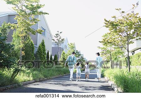 Happy Japanese family in a city park View Large Photo Image Picture - Happy Japanese family in a city park. Fotosearch