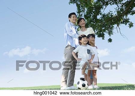 Happy Japanese family in a city park View Large Photo Image Stock Image - Happy Japanese family in a city park. Fotosearch