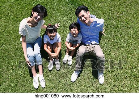 Happy Japanese family in a city park View Large Photo Image Stock Image - Happy Japanese family in a city park. Fotosearch