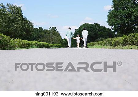 Happy Japanese family in a city park View Large Photo Image Stock Image - Happy Japanese family in a city park. Fotosearch