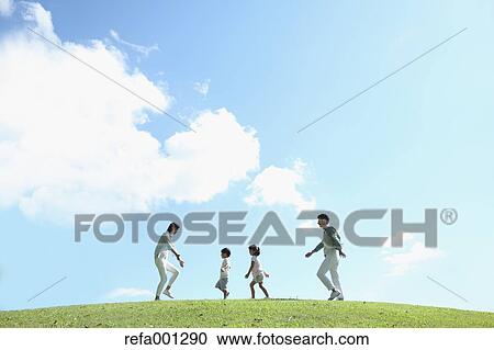 Happy Japanese family in a city park View Large Photo Image Stock Image - Happy Japanese family in a city park. Fotosearch