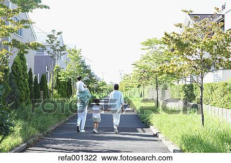 Happy Japanese family in a city park View Large Photo Image Stock Image - Happy Japanese family in a city park. Fotosearch