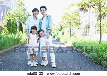 Happy Japanese family in a city park View Large Photo Image Stock Image - Happy Japanese family in a city park. Fotosearch