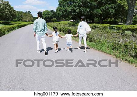 Happy Japanese family in a city park View Large Photo Image Stock Photo - Happy Japanese family in a city park. Fotosearch