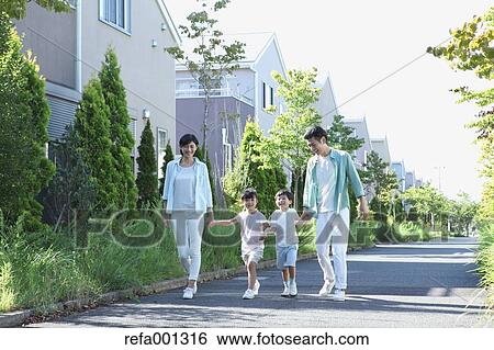 Happy Japanese family in a city park View Large Photo Image Stock Photograph - Happy Japanese family in a city park. Fotosearch