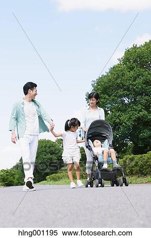 Happy Japanese family in a city park View Large Photo Image Stock Photography - Happy Japanese family in a city park. Fotosearch